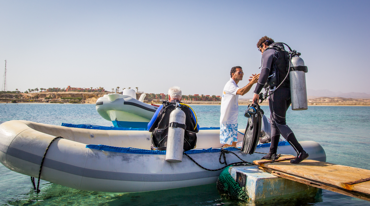 A helping hand on board our Ducks Diving Superior zodiac on route to Marsa Asalaya..