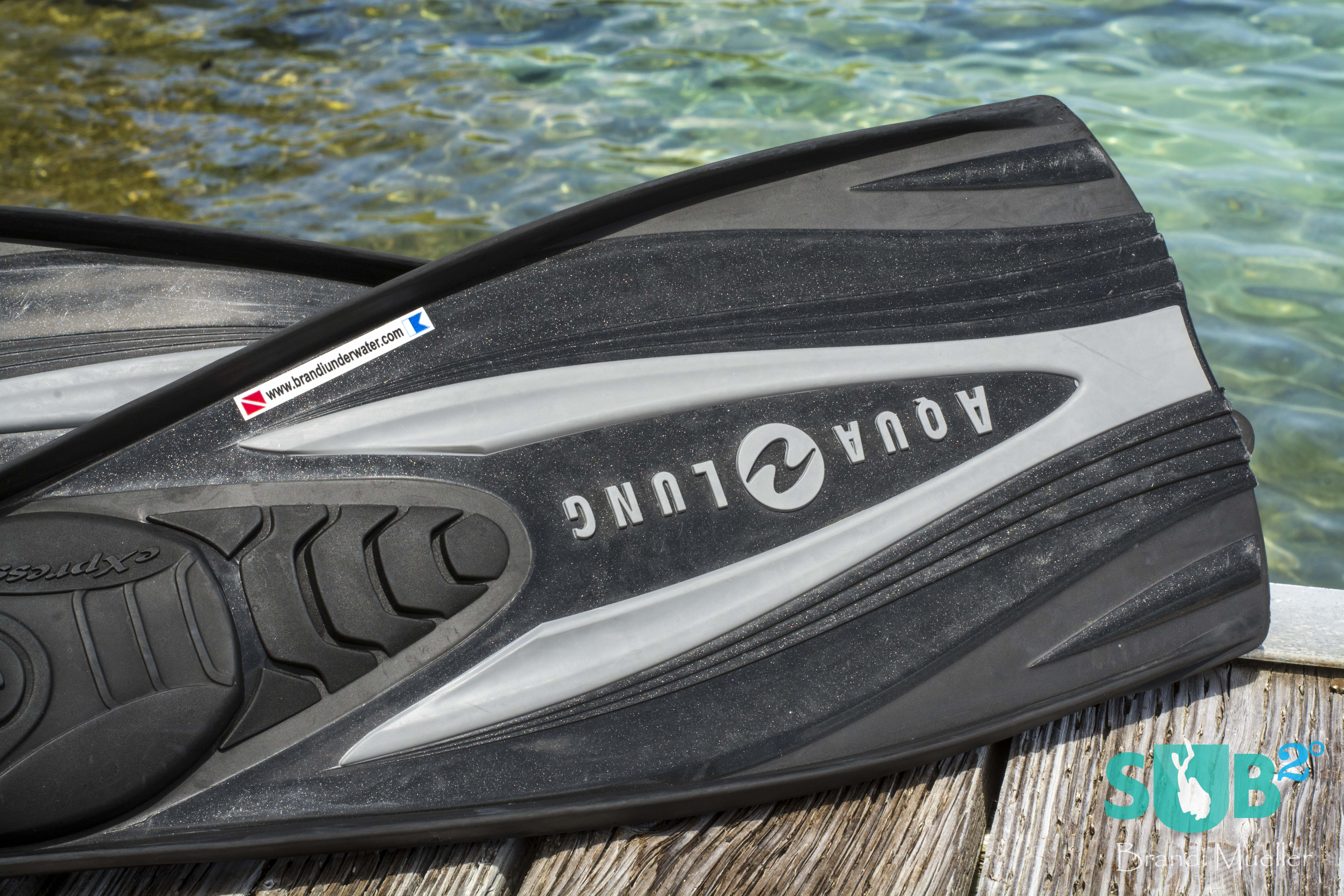 Lots of divers may have the same fins on a busy dive boat.  A simple waterproof sticker with your name on it can help keep you find your own fins in a pile of many.