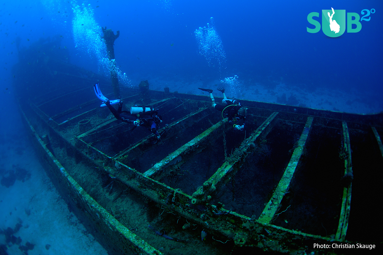 A wreck shows itself in blue and green colors at depth, unless you bring an artificial light source.