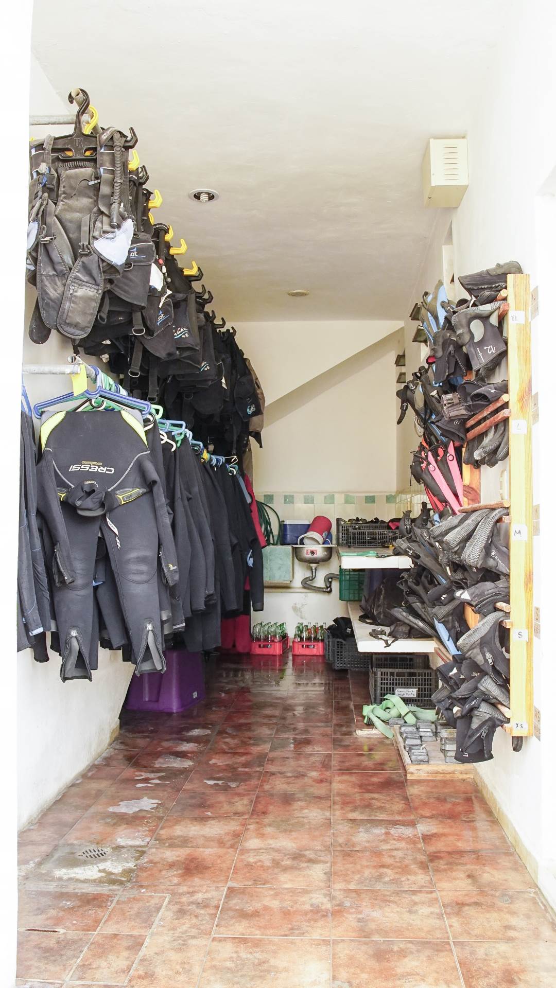 Wet suits at Koox Diving shop in Tulum